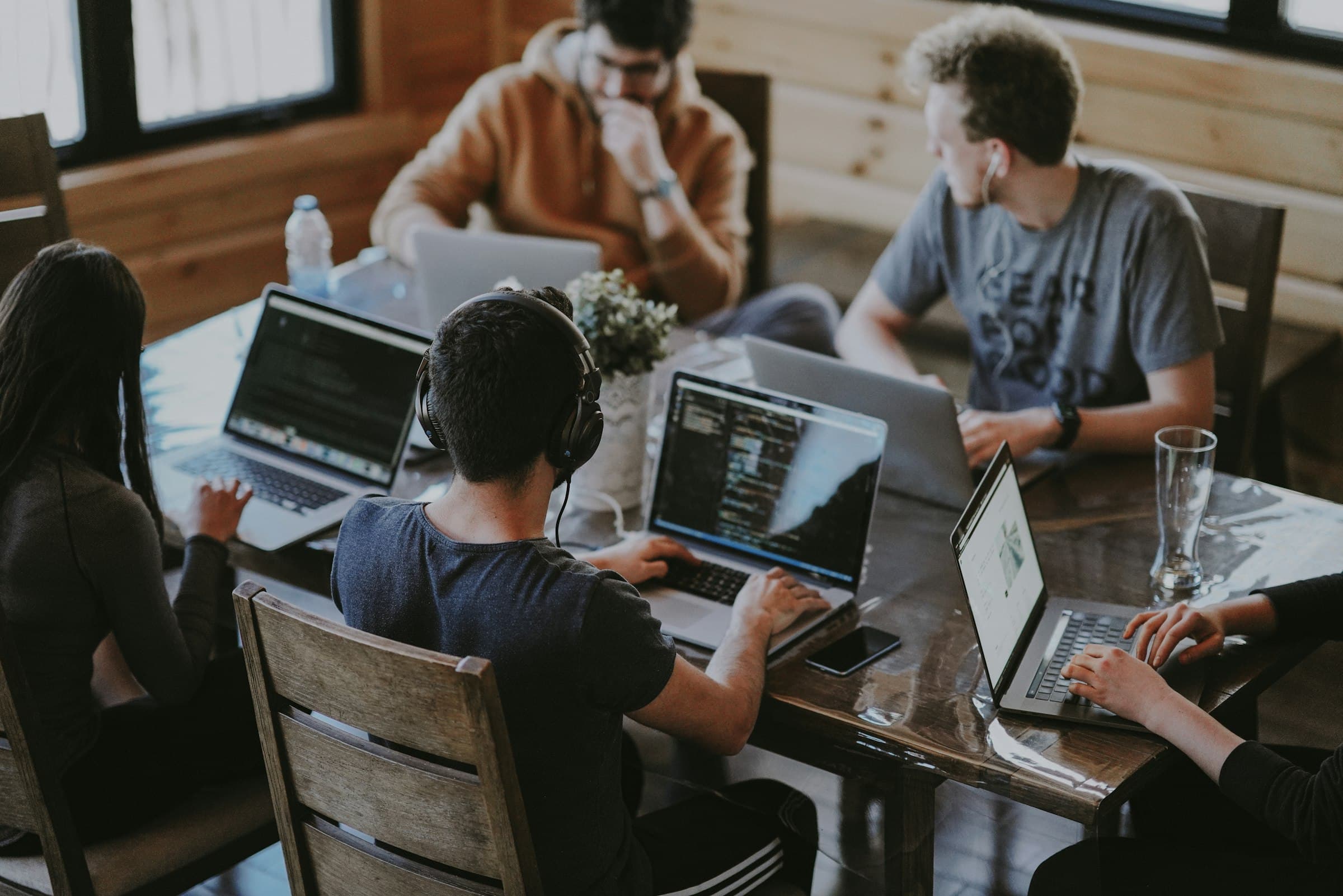 Team collaborating around a table in a bright office